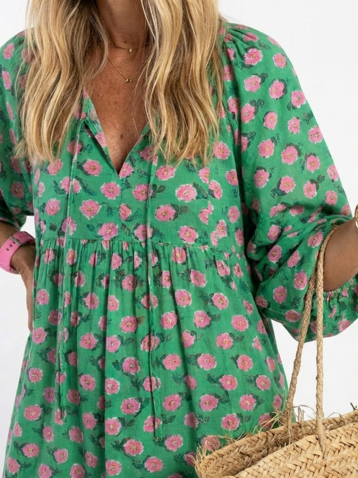Flore | Robe midi à volants et col en V à imprimé fleuri